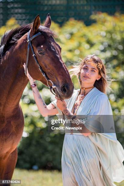 Paris Jackson poses with 2017 Melbourne Cup runner 'Marmelo' during a media call in Melbourne, Victoria.