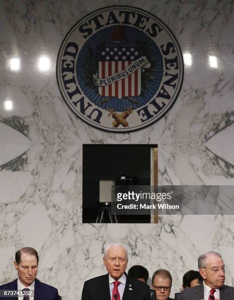 Chairman Orrin Hatch , Sen. Ron Wyden , and Sen. Chuck Grassley , participate in a Senate Finance Committee markup of the Tax Cuts and Jobs Act...