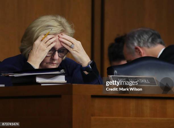 Sen. Claire McCaskill , reads her papers during a Senate Finance Committee markup of the Tax Cuts and Jobs Act legislation on Capitol Hill, November...