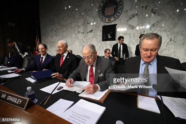Sen. Ron Wyden , Chairman Orrin Hatch , Sen. Chuck Grassley , and Sen. Mike Crapo , participate in the Senate Finance Committee markup of the Tax...