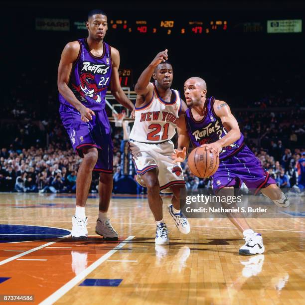 Damon Stoudamire of the Toronto Raptors drives during a game played on November 14, 1996 at Madison Square Garden in New York City. NOTE TO USER:...