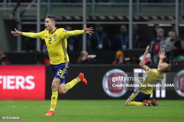 Mikael Lustig of Sweden celebrates at full time during the FIFA 2018 World Cup Qualifier Play-Off: Second Leg between Italy and Sweden at San Siro...