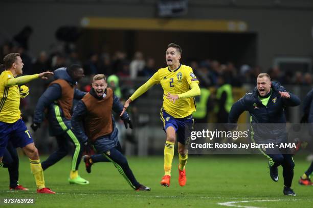 Mikael Lustig of Sweden celebrates at full time during the FIFA 2018 World Cup Qualifier Play-Off: Second Leg between Italy and Sweden at San Siro...