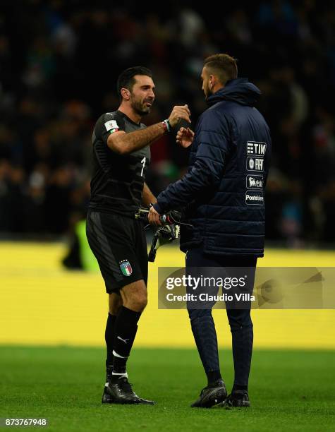 Gianluigi Buffon and Gianluigi Donnarumma of Italy dejected at the end of the FIFA 2018 World Cup Qualifier Play-Off: Second Leg between Italy and...