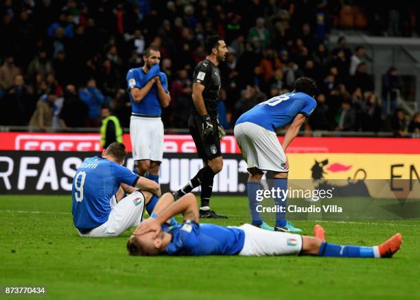 Players of Italy dejected at the end of the FIFA 2018 World Cup Qualifier Play-Off: Second Leg between Italy and Sweden at San Siro Stadium on...