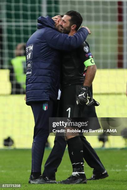 An emotional Gianluigi Buffon of Italy and Gianluigi Donnarumma of Italy at full time during the FIFA 2018 World Cup Qualifier Play-Off: Second Leg...