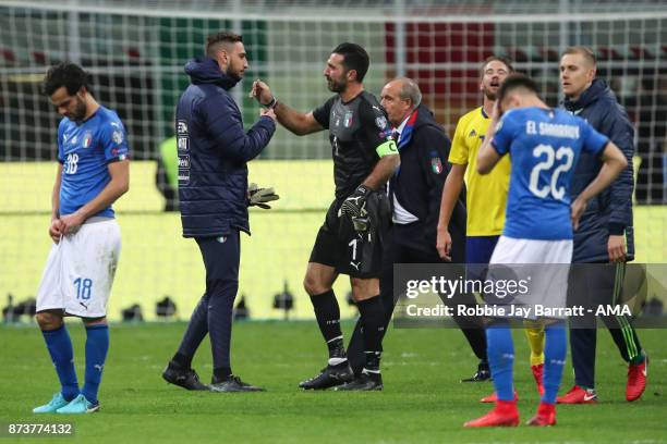 An emotional Gianluigi Buffon of Italy and Gianluigi Donnarumma of Italy at full time during the FIFA 2018 World Cup Qualifier Play-Off: Second Leg...