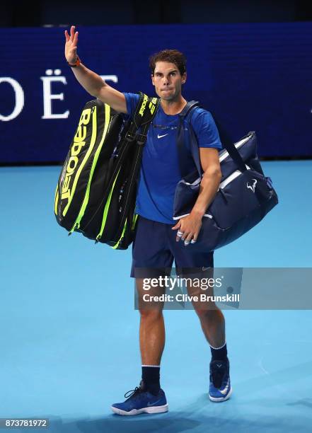 Rafael Nadal of Spain leaves the court after defeat in his Singles match against David Goffin of Belgium during day two of the Nitto ATP World Tour...