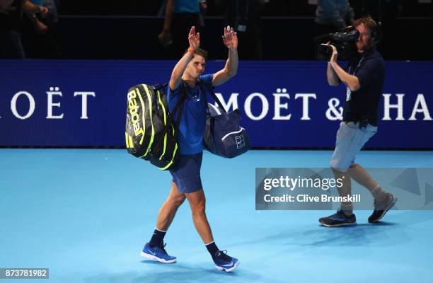 Rafael Nadal of Spain leaves the court after defeat in his Singles match against David Goffin of Belgium during day two of the Nitto ATP World Tour...