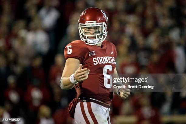 Quarterback Baker Mayfield of the Oklahoma Sooners looks to the sidelines in between plays against the TCU Horned Frogs at Gaylord Family Oklahoma...