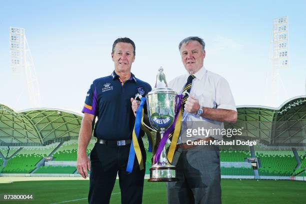Melbourne Storm Head Coach Craig Bellamy and Leeds Rhino's CEO Gary Hetherington pose with the World Club Challenge Trophy during a Melbourne Storm...