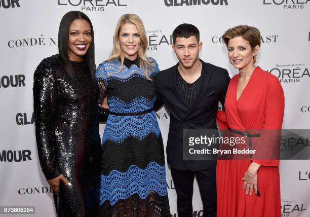 Anne Marie Nelson-Bogle, Alison Moore, Nick Jonas, and Cindi Leive attend Glamour's 2017 Women of The Year Awards at Kings Theatre on November 13,...