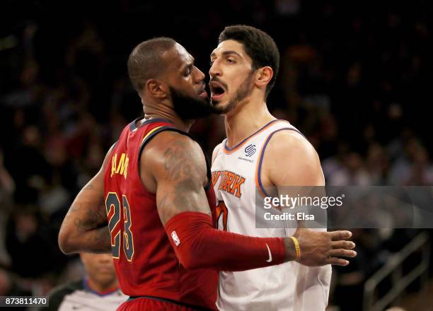 LeBron James of the Cleveland Cavaliers and Enes Kanter of the New York Knicks exchange words in the first half at Madison Square Garden on November...