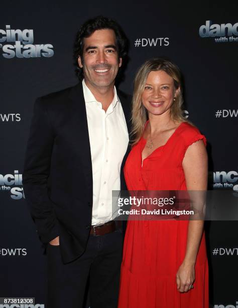 Personality Carter Oosterhouse and wife actress Amy Smart pose at "Dancing with the Stars" season 25 at CBS Televison City on November 13, 2017 in...