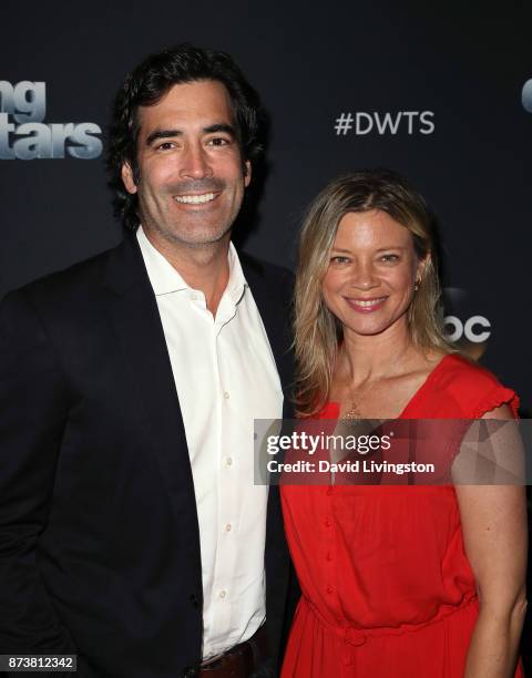 Personality Carter Oosterhouse and wife actress Amy Smart pose at "Dancing with the Stars" season 25 at CBS Televison City on November 13, 2017 in...