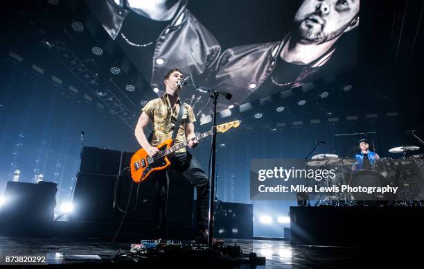 Mike Kerr and Ben Thatcher of Royal Blood perform on stage at Motorpoint Arena on November 13, 2017 in Cardiff, Wales.