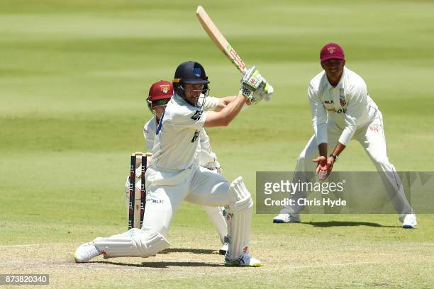 Peter Nevill of New South Wales bats during day two of the Sheffield Shield match between Queensland and New South Wales at Allan Border Field on...