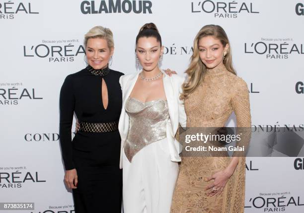 Yolanda Foster, Bella Hadid and Gigi Hadid attend the 2017 Glamour Women of The Year Awards at Kings Theatre on November 13, 2017 in New York City.