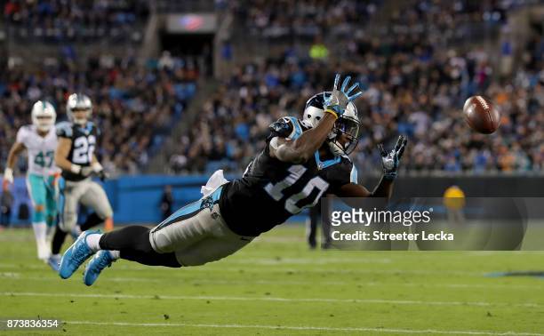 Curtis Samuel of the Carolina Panthers dives for a pass against the Miami Dolphins in the first quarter during their game at Bank of America Stadium...