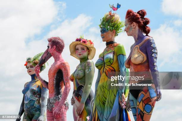 Models pose for the Body Art contest during New Zealand Trotting Cup Day at Addington Raceway on November 14, 2017 in Christchurch, New Zealand.