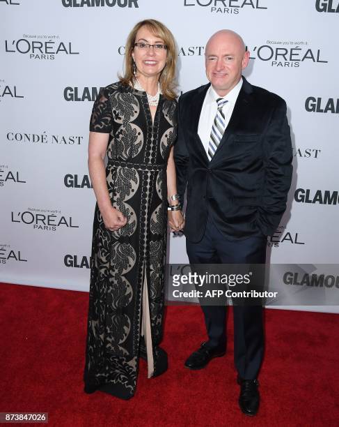 Gabrielle Giffords and Mark Kelly attend Glamour's 2017 Women of The Year Awards at Kings Theatre on November 13, 2017 in Brooklyn, New York. / AFP...