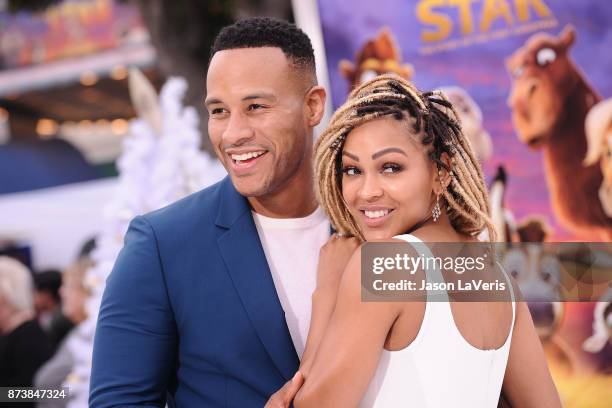 Producer DeVon Franklin and actress Meagan Good attend the premiere of "The Star" at Regency Village Theatre on November 12, 2017 in Westwood,...