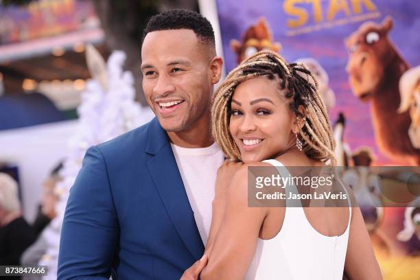 Producer DeVon Franklin and actress Meagan Good attend the premiere of "The Star" at Regency Village Theatre on November 12, 2017 in Westwood,...