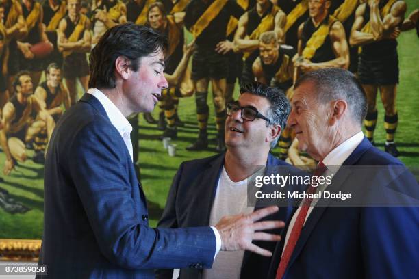 Gillon McLachlan former AFL CEO Andrew Demetriou and incoming Hawks President Jeff Kennett talk together during the book launch for 'Patrick Smith's...