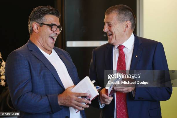 Former AFL CEO Andrew Demetriou and incoming Hawks President Jeff Kennett talk together during the book launch for 'Patrick Smith's Sport - Best of...