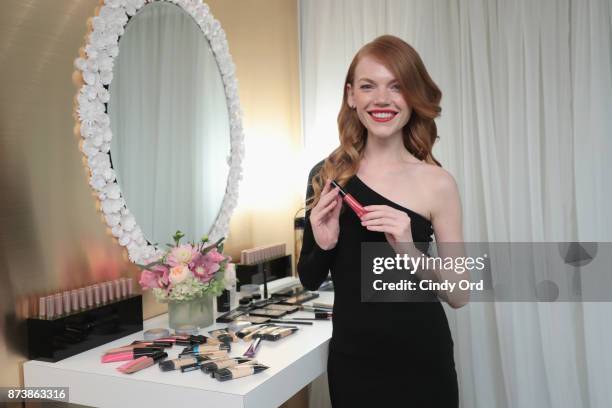 Make up artists poses backstage at Glamour's 2017 Women of The Year Awards at Kings Theatre on November 13, 2017 in Brooklyn, New York.