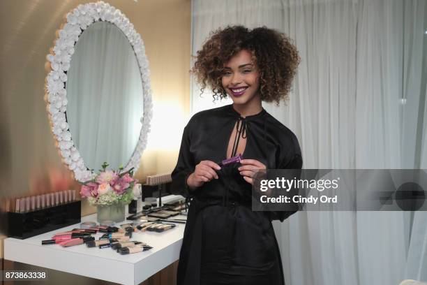 Make up artists poses backstage at Glamour's 2017 Women of The Year Awards at Kings Theatre on November 13, 2017 in Brooklyn, New York.