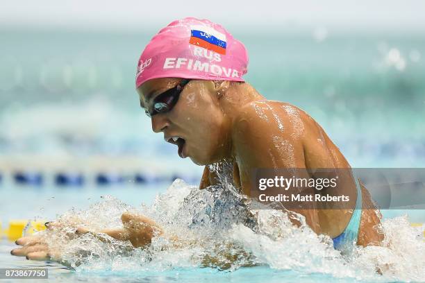 Yuliya Efimova of Russia competes in the Women's 200m Breaststroke heats during day one of the FINA Swimming World Cup at Tokyo Tatsumi International...