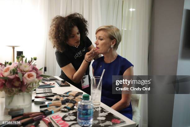 Planned Parenthood President Cecile Richards gets her make up done backstage at Glamour's 2017 Women of The Year Awards at Kings Theatre on November...