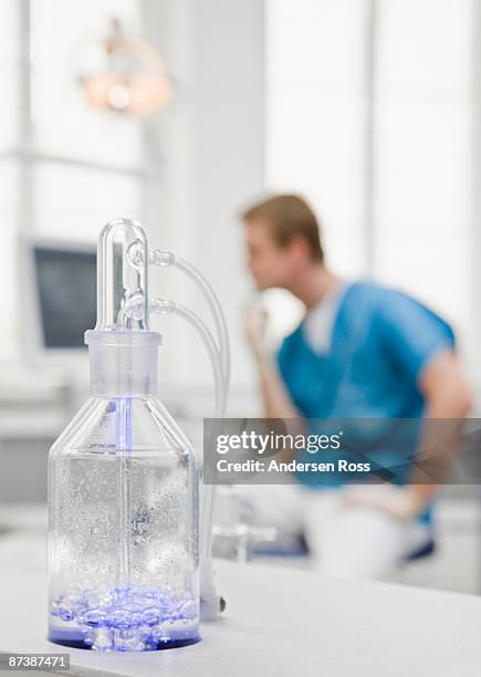 detail of dental equipment - liquid solution stock pictures, royalty-free photos & images