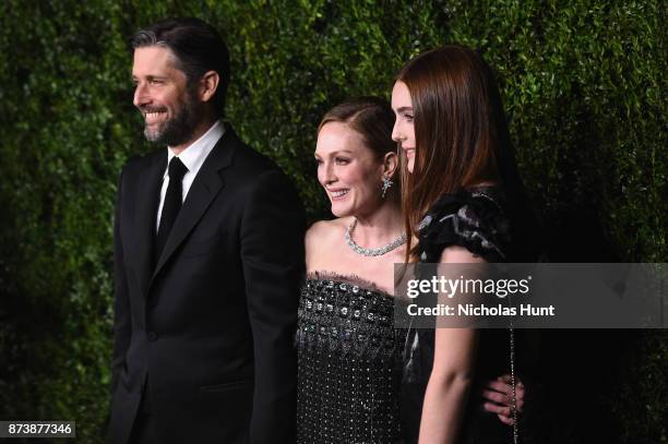 Bart Freundlich, Julianne Moore, and Liv Helen Freundlich attend The Museum of Modern Art Film Benefit presented by CHANEL: A Tribute to Julianne...