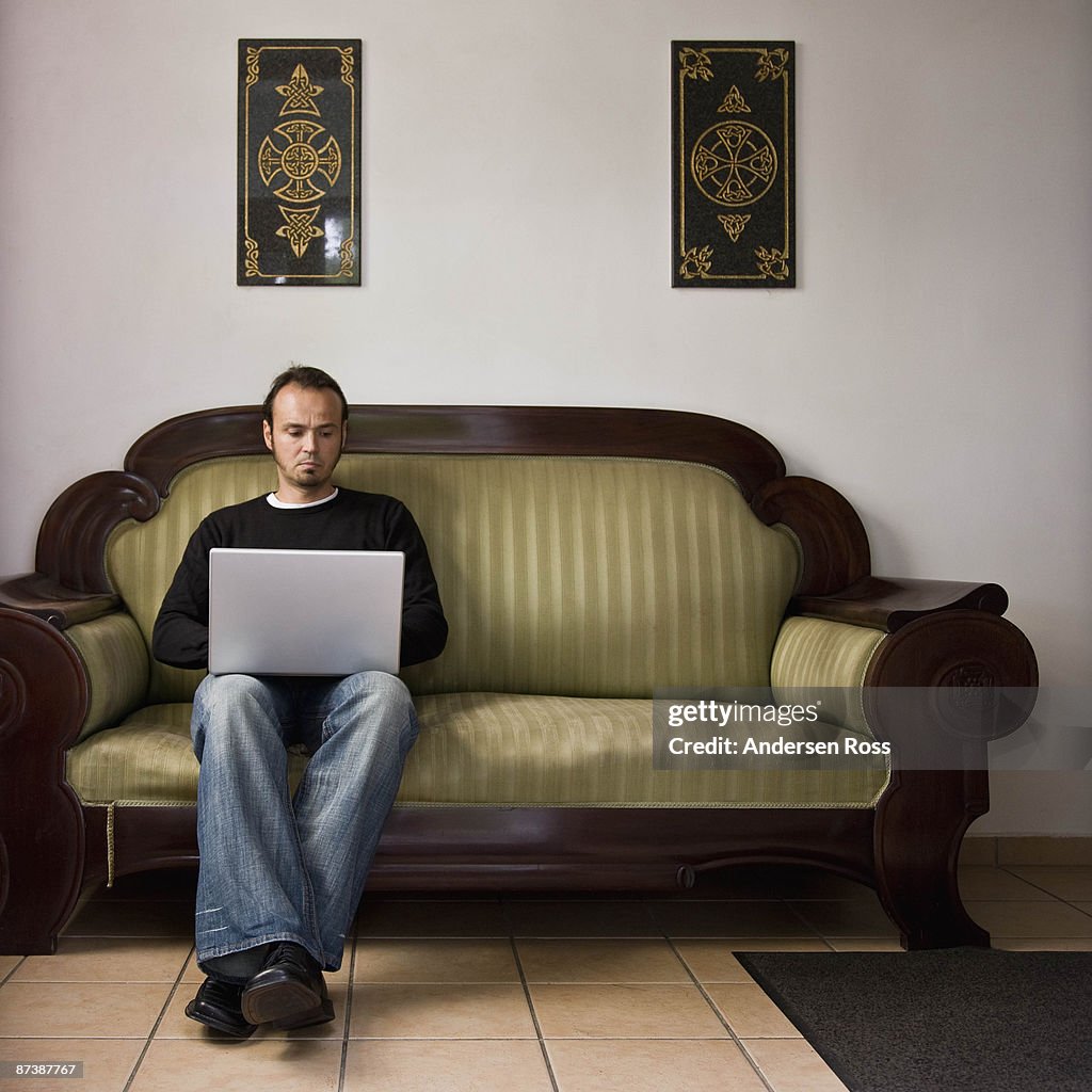 Man working on a laptop computer