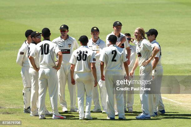 David Moody of Western Australia celebrates the wicket of John Dalton of South Australia with team mates during day two of the Sheffield Shield match...