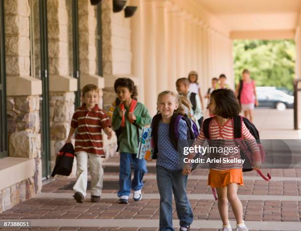 students arriving to school - arriving late class stockfoto's en -beelden