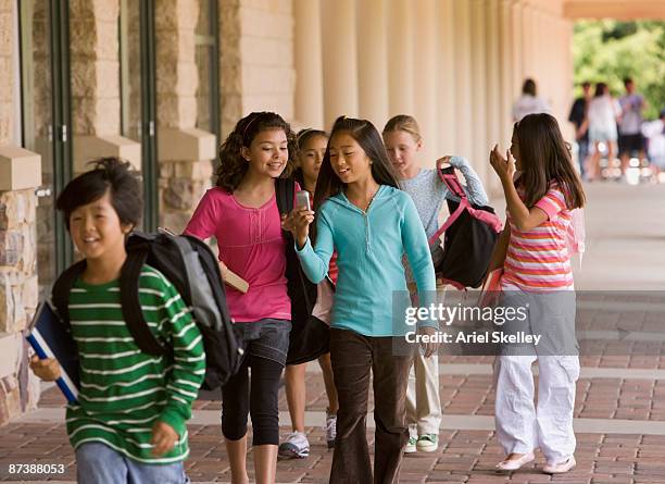 students arriving to school - arriving late class stockfoto's en -beelden