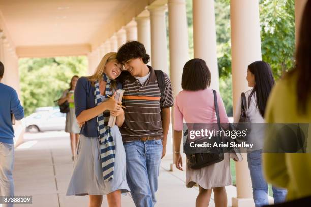 Teenage Couple Walking Together, Foto de stock