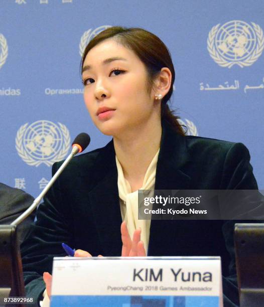 South Korean Olympic gold medalist Kim Yu Na speaks at a press conference at the U.N. Headquarters in New York on Nov. 13 after the U.N. General...