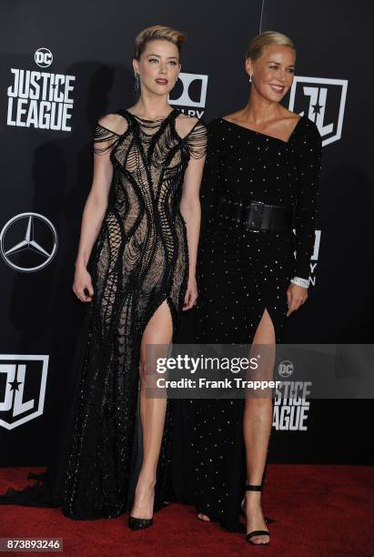 Actors Amber Heard and Connie Nielsen attend the premiere of Warner Bros. Pictures' "Justice League" held at the Dolby Theatre on November 13, 2017...