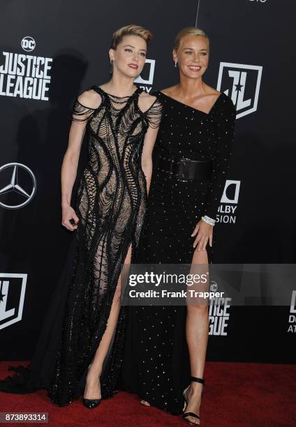 Actors Amber Heard and Connie Nielsen attend the premiere of Warner Bros. Pictures' "Justice League" held at the Dolby Theatre on November 13, 2017...