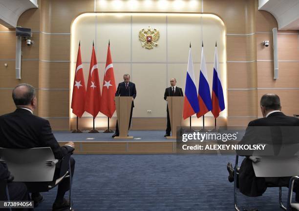 Russian President Vladimir Putin and Turkish President Recep Tayyip Erdogan address a press conference at the Bocharov Ruchei state residence in the...