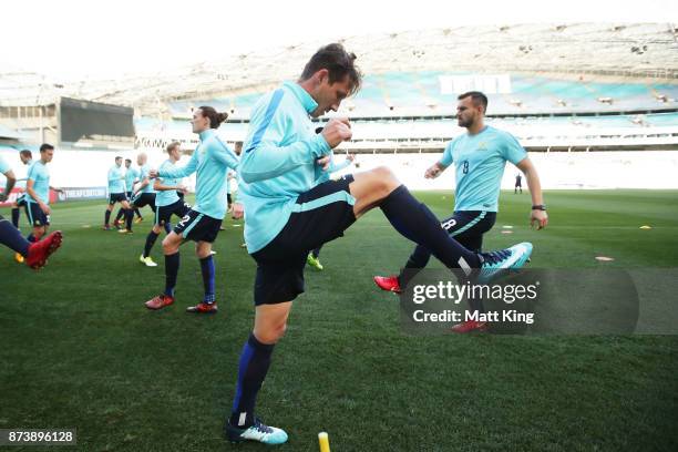 Mark Milligan of Australia warms up during an Australian Socceroos training session at ANZ Stadium ahead of their World Cup 2018 qualifying play-off...