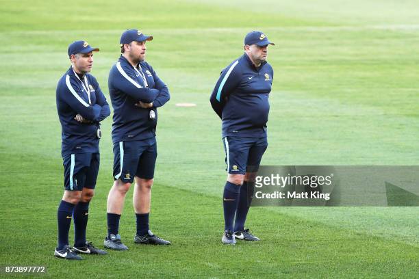 Australia head coach Ange Postecoglou and coaching staff look on during an Australian Socceroos training session at ANZ Stadium ahead of their World...