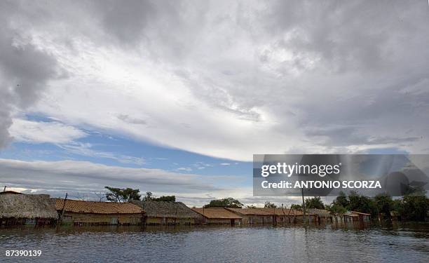 The roofs of the houses of the village of Bacabal barely emerge from the waters of the flooded Mearim River, state of Maranhao, northern Brazil May...