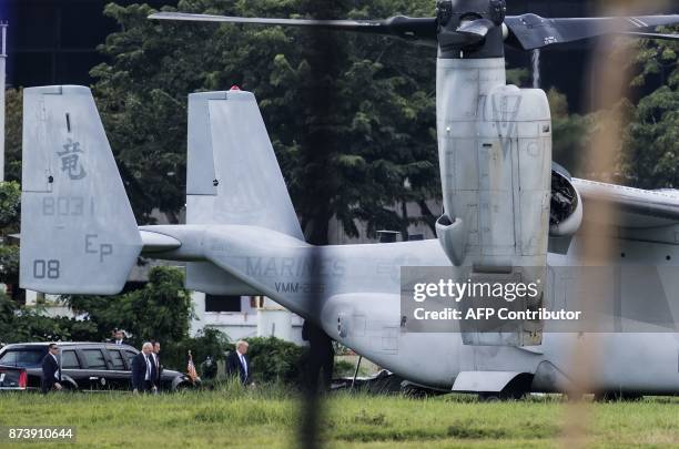 President Donald Trump prepares to board Marine One after attending the 31st Association of Southeast Asian Nations Summit and Related Meetings in...