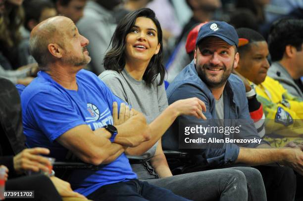 Model Kendall Jenner and producer Michael D. Ratner attend a basketball game between the Los Angeles Clippers and the Philadelphia 76ers at Staples...