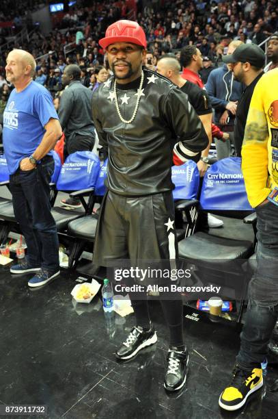 Boxer Floyd Mayweather attends a basketball game between the Los Angeles Clippers and the Philadelphia 76ers at Staples Center on November 13, 2017...